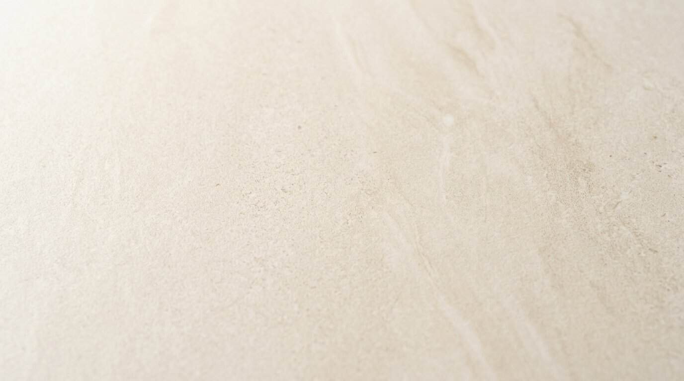 Close-up of beige tile surface for kitchen or bathroom design.